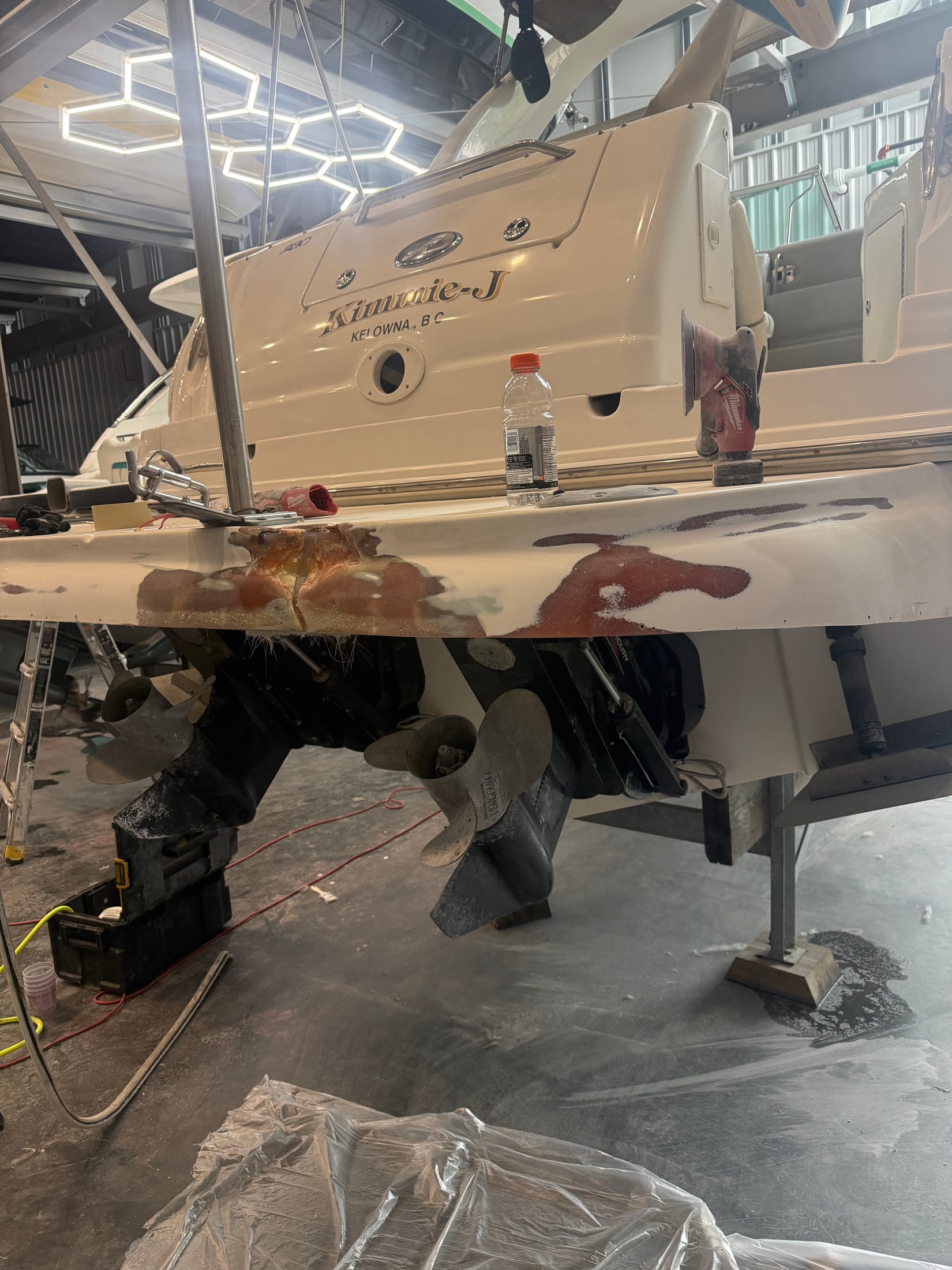 Boat stern platform during fibreglass rebuilding and surface preparation